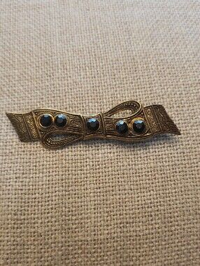 Vintage-Inspired Gold Tone Bow Brooch with Black Faceted Accents